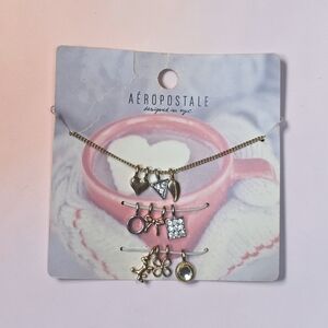 Aeropostale Gold Tone Charm Necklace Set With Changable Charms